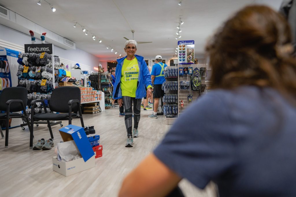 Woman trying on walking shoes