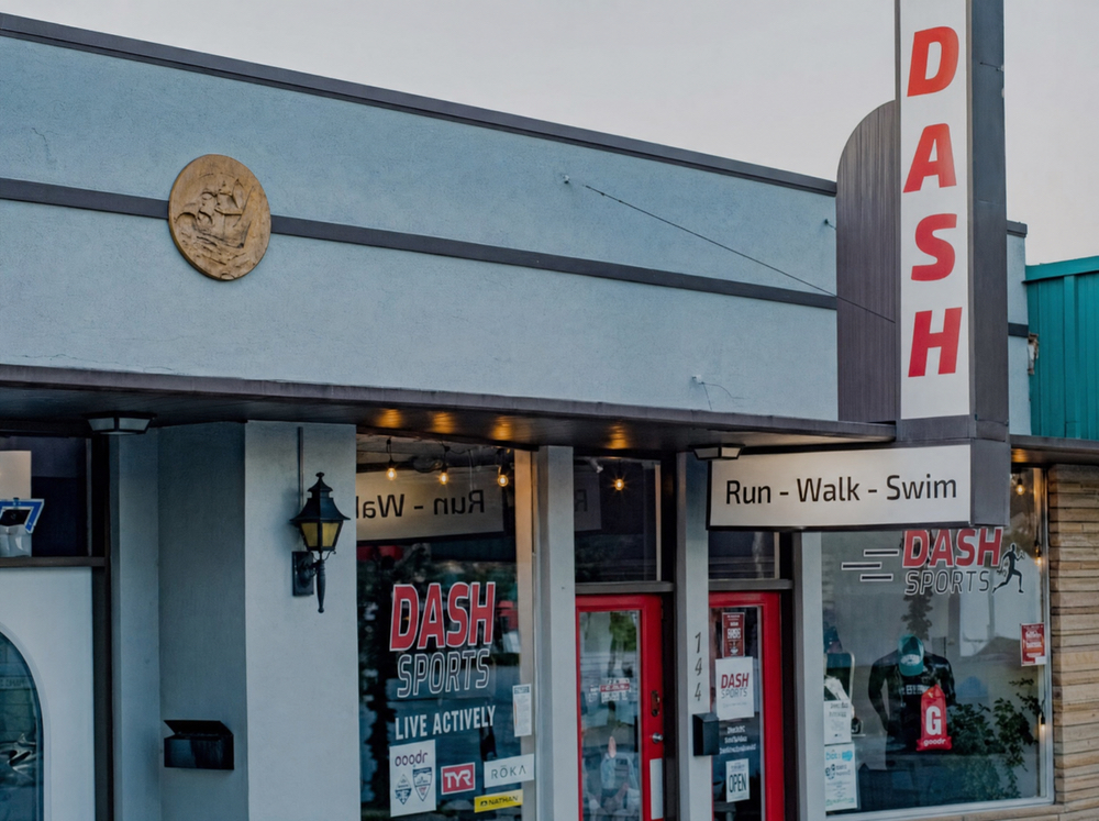Storefront of the Dash Sports shoe store on West Montrose Street in downtown Clermont, FL with Run Walk Swim and Live Actively signage