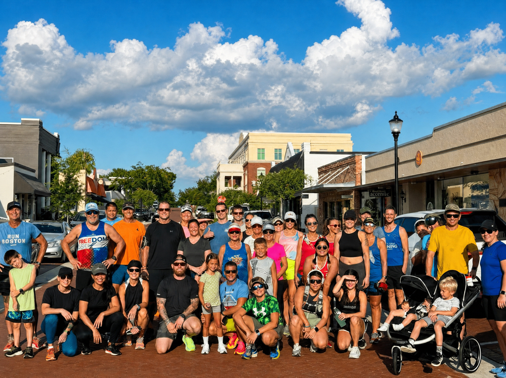 Runners and walkers of all ages gathered outside Dash Sports in Clermont, FL before a free community social run